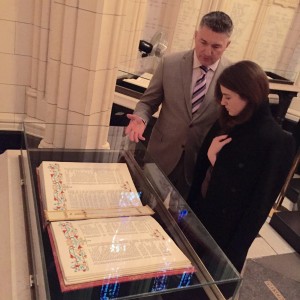 Yulia looks at a World War II-era Book of the Dead.